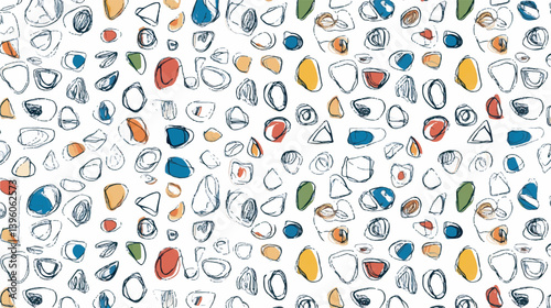 Colorful shapes scatter across white surface creating abstract background