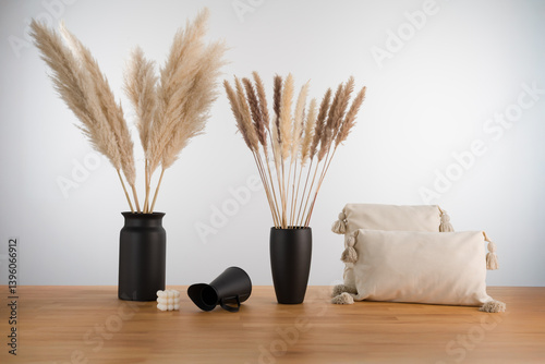 Obraz na płótnie Pampas Grass and Cushions: Boho Interior Still Life with Candles w salonie