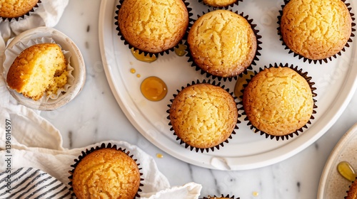 Classic honey butter dip a small white dish smooth and golden served with warm cornbread muffins