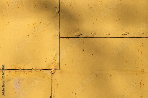 Obraz na płótnie Yellow painted metal panels with rust and welding seams, industrial texture w salonie