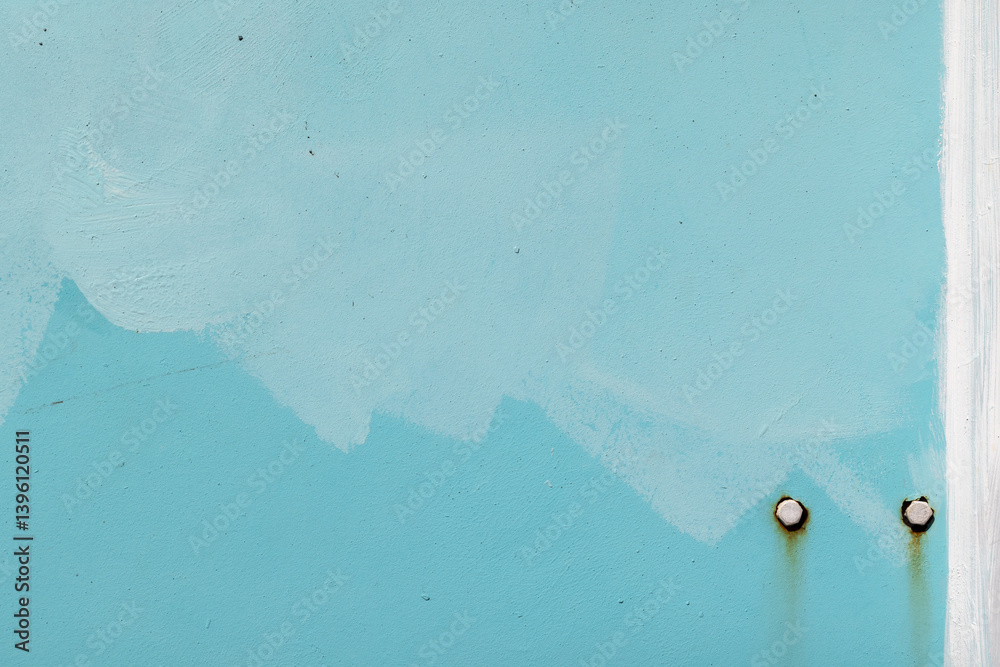 A textured close-up photo of a light blue metal wall with two rusty bolts
