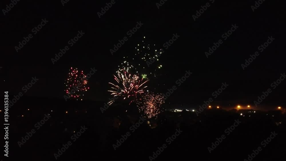 Drone footage of July 4th fireworks over Arlington, Tennessee, looking toward Memphis
