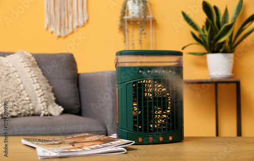 Portable table fan with hum...