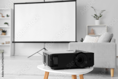 Video projector on table in light room, closeup