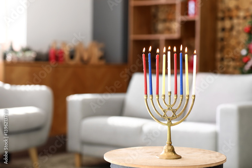 Menorah with burning candle...