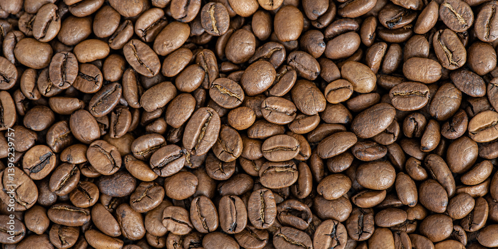 Roasted coffee beans as a background macro photo. Food, drink coffee.