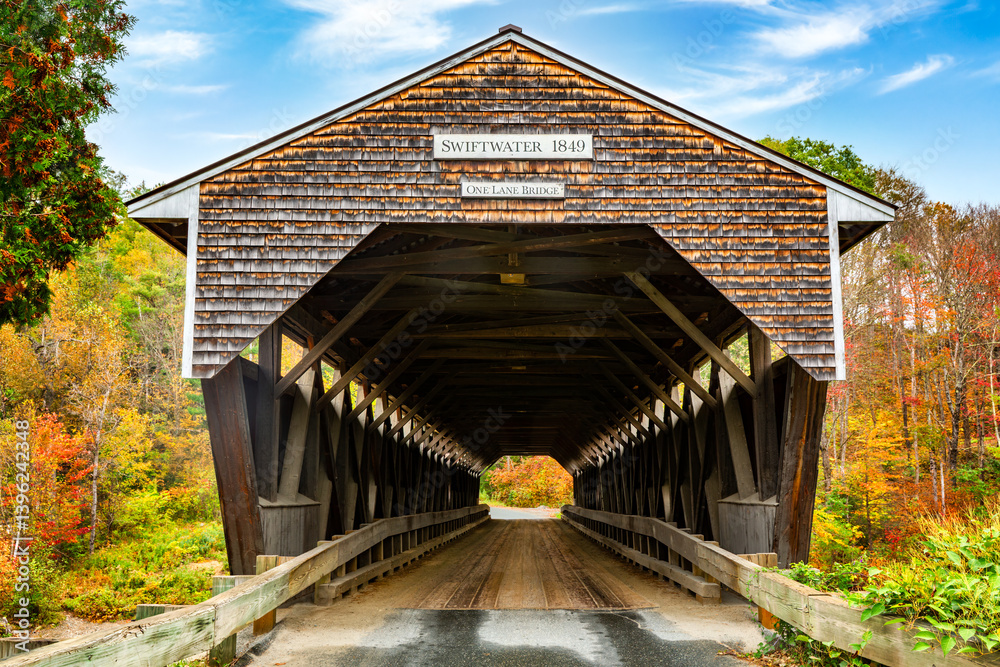 Swiftwater Covered Bridge in Bath, New Hampshire. Built in 1849, Swiftwater Covered Bridge is one of New Hampshire's few surviving 19th-century covered bridges.