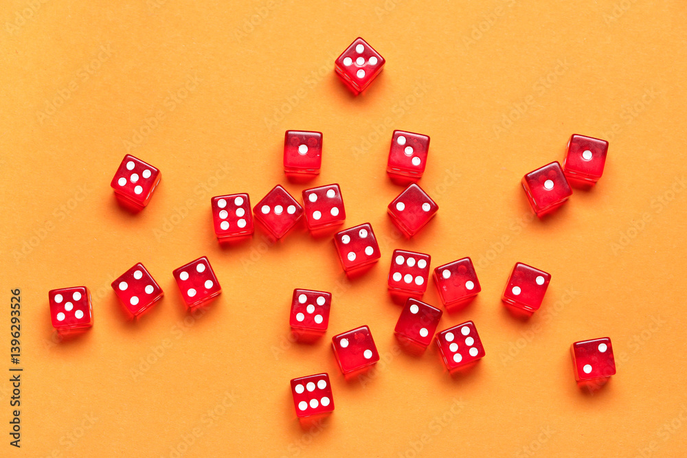 Red game dices on orange background Red game dices on orange background