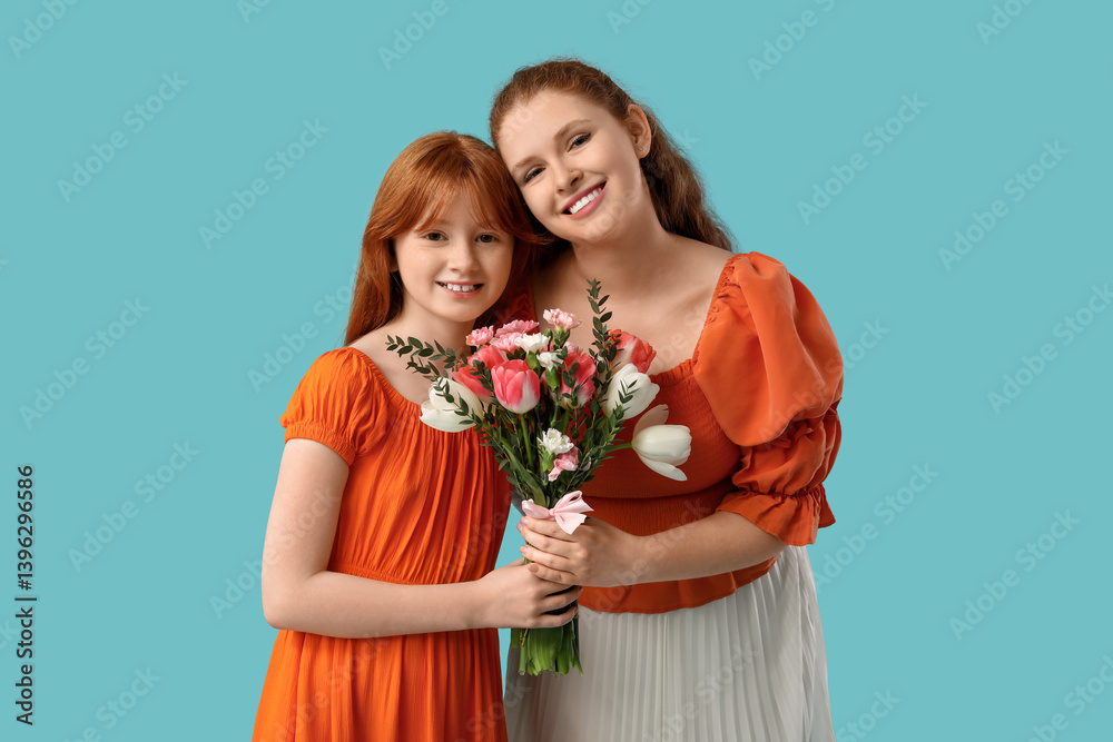 Happy young woman with her cute daughter holding bouquet of beautiful flowers on blue background. Mother's Day celebration
