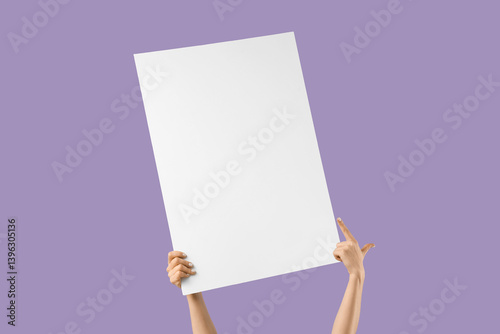 Female hands with blank pos...