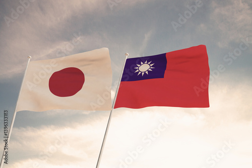 Flags of Japan and Taiwan waving with cloudy blue sky background, 3D rendering