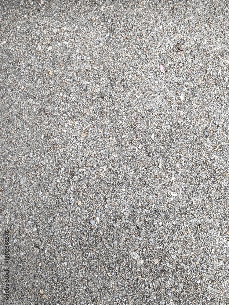 Close-up of a Textured Gray Asphalt Surface Showing Fine Aggregate Details Close-up of a Textured Gray Asphalt Surface Showing Fine Aggregate Details