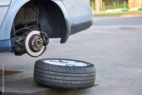 Service for the repair of a car wheels.Changing seasonal tires