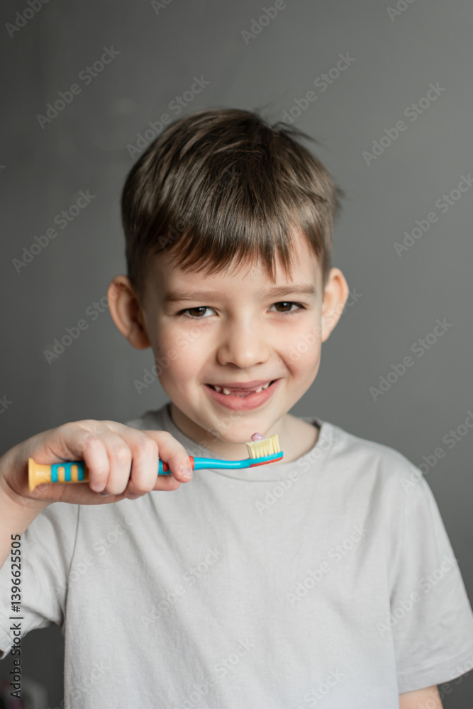 oral hygiene. dental care. replacement of baby teeth with molars. A preschool-age boy brushes his teeth thoroughly with a toothbrush. production of oral hygiene products oral hygiene. dental care. replacement of baby teeth with molars. A preschool-age boy brushes his teeth thoroughly with a toothbrush. production of oral hygiene products