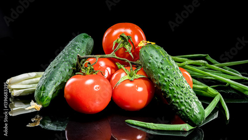 Obraz na płótnie Fresh Tomatoes and Cucumbers on Black Background w salonie