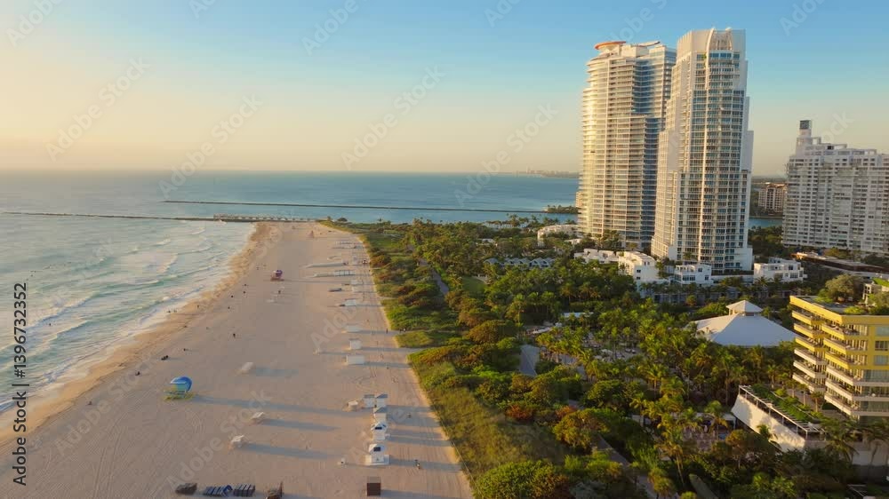 Enjoy a breathtaking sunrise at South Pointe Pier, with stunning views of Miami Beach, Fisher Island, and the vibrant downtown skyline, creating a perfect start to your day and lasting memories Enjoy a breathtaking sunrise at South Pointe Pier, with stunning views of Miami Beach, Fisher Island, and the vibrant downtown skyline, creating a perfect start to your day and lasting memories