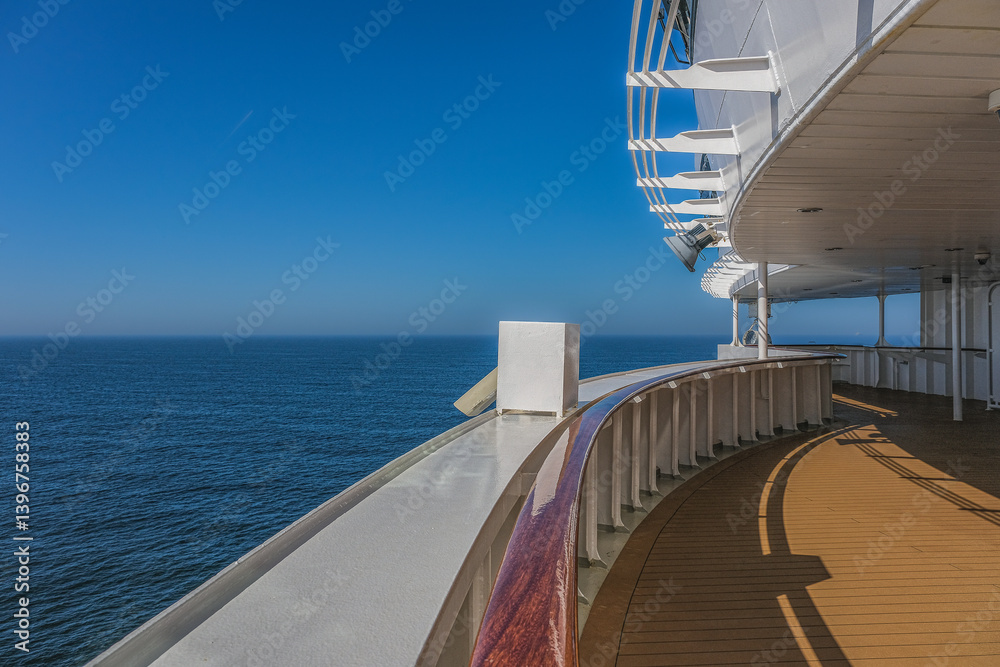Views from outdoor teak balcony terrace veranda promenade observation deck of ocean liner cruiseship cruise ship with at sea during Transatlantic Crossing to New York on beautiful sun day