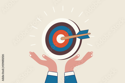 Goal or target, focus and concentration to achieve success, purpose or objective, aiming at target bullseye, accuracy, challenge and aspiration, businessman hand hold target with arrow hit bullseye.