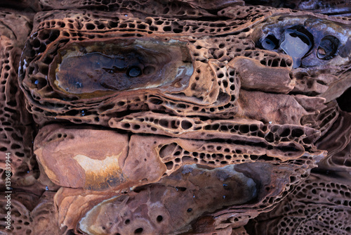 Incredible erosion patterns on rocks along the shore, Thailand