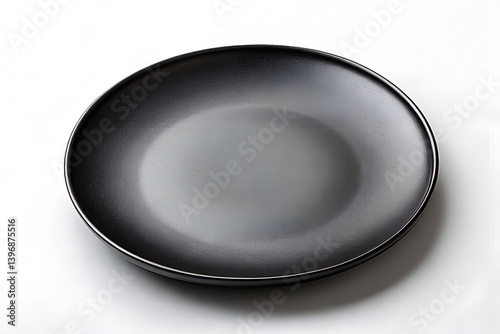 Black cast iron frying pan isolated on white background