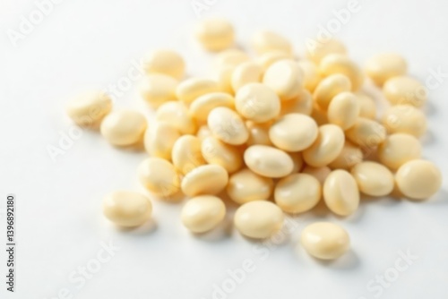 Scattered white beans on pristine white background, food, texture