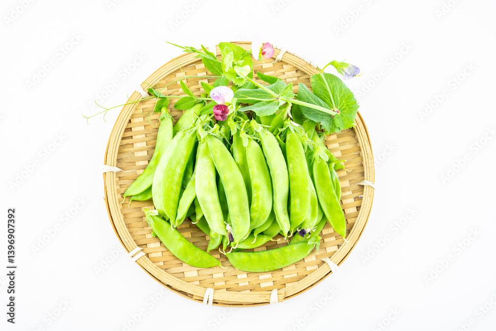 A plate of fresh peas on white background A plate of fresh peas on white background