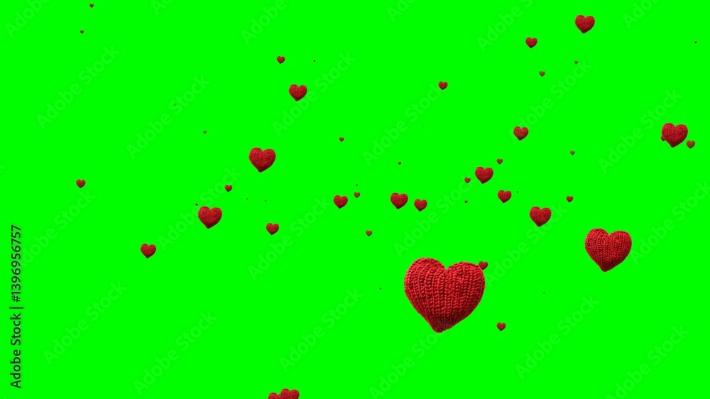 Red knitted fabric heart or love symbol flying animated on green screen.Heart or love symbol animated flying particles