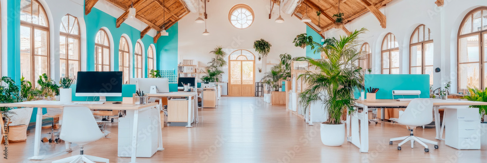 Fototapeta premium Eco-Friendly Workspace: A modern office filled with greenery and natural light, for a healthy work environment.
