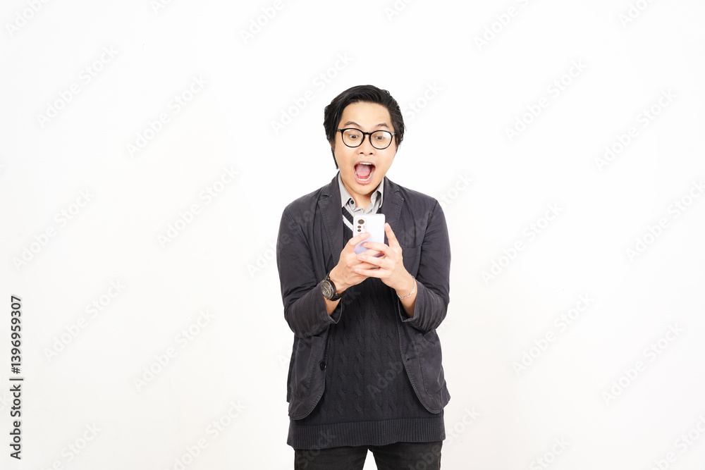 Holding and Using Smartphone with shocking WOW face Of Handsome Asian Man Isolated On White Background Holding and Using Smartphone with shocking WOW face Of Handsome Asian Man Isolated On White Background