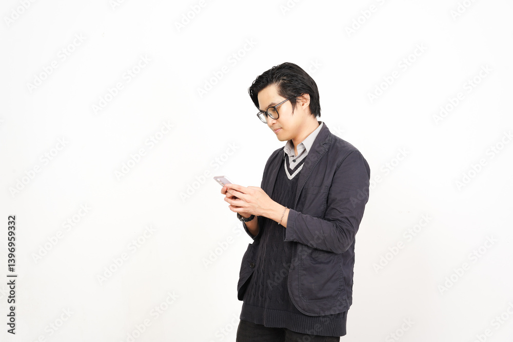 Holding and Using Smartphone Of Handsome Asian Man Isolated On White Background Holding and Using Smartphone Of Handsome Asian Man Isolated On White Background