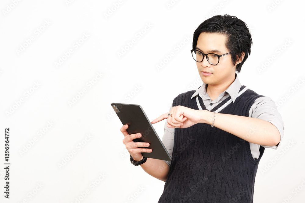 Holding and Using Tablet Of Handsome Asian Man Wearing Black Suit Isolated On White Background Holding and Using Tablet Of Handsome Asian Man Wearing Black Suit Isolated On White Background