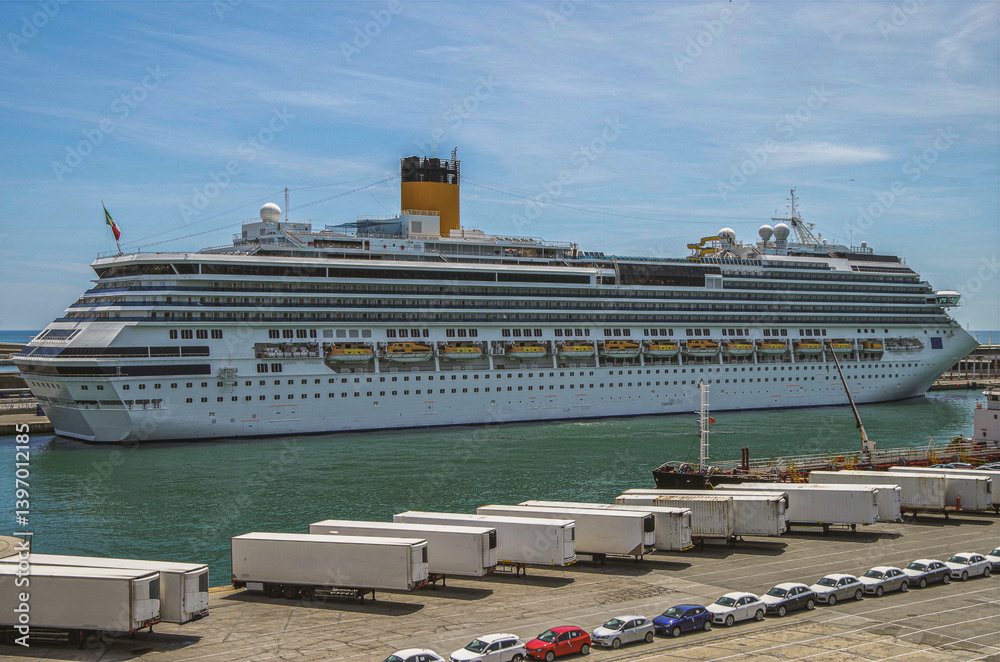 Modern family cruiseship Pacifica and other cruise ship liners in port of Barcelona, Spain on sunny summer day seen from landside during Mediterranean cruising