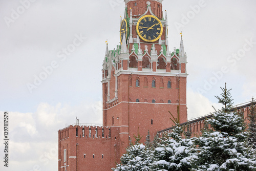 View to the Kremlin tower on Red square in Moscow during snow photo
