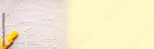 The SPF drawing by sunscreen on orange plastic bottle, numbers drawing on the sand. UV protection from sun, choosing a sun cream. Sun tan, summer skin care, health. Copy spac.  Empty place