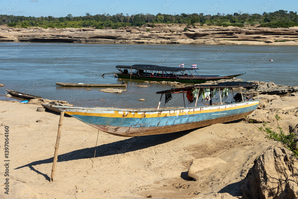 A boat on the banks of the Mekong River at the Thai-Lao border