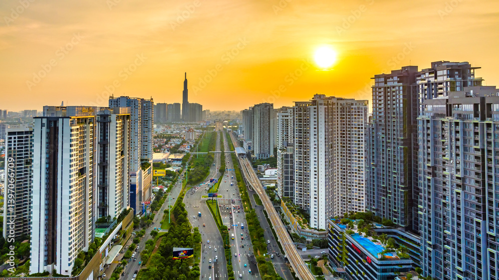 Aerial view of Saigon cityscape with a complex highway intersection. Urban development texture, transport infrastructure, Financial and business centers