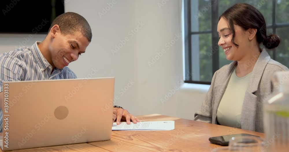 businesswoman signing papers during job interview with businessman , then shaking hands in office businesswoman signing papers during job interview with businessman , then shaking hands in office