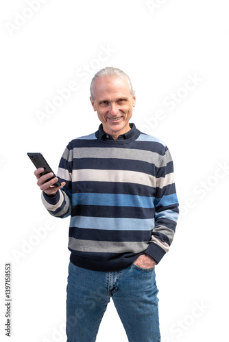 Smiling senior man holding smartphone, enjoying mobile technology