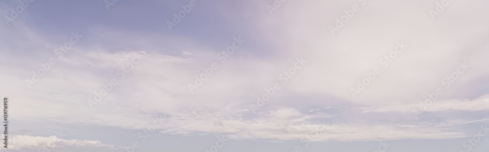 Soft cloudy sky with light pastel colors creating a serene atmosphere. Soft cloudy sky with light pastel colors creating a serene atmosphere.
