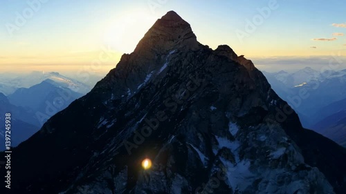 Majestic Mountain Peak at Sunrise, Aerial View