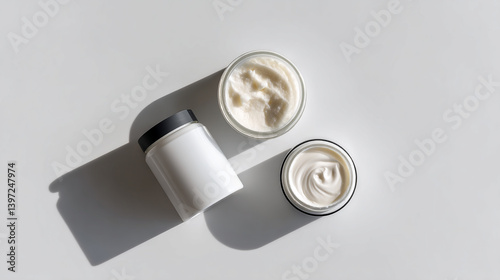 Top view of skincare cream products for moisturizing skin and beauty treatment on white background