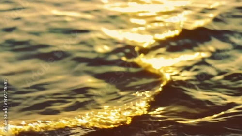 Golden Sunset Light Reflecting on Ocean Waves