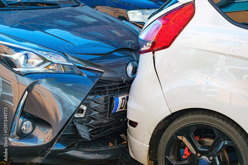 Принти на полотні Road accident showing collision of two cars with broken bumpers and details