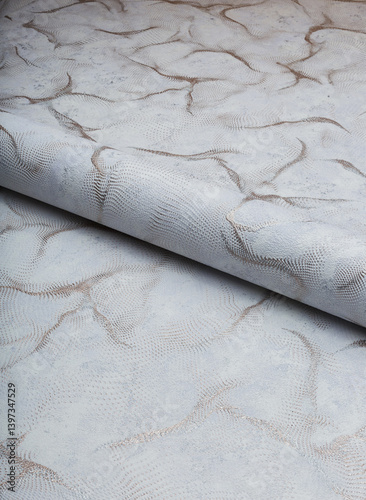 Obraz na płótnie Large roll of wallpaper for the wall with a beautiful texture w salonie