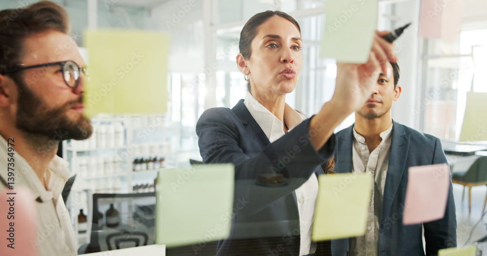 Obraz premium Writing, ideas and woman with sticky notes, colleagues and planning for financial growth and company. Reminder, banker and info for potential investment, mature person and collaboration in business