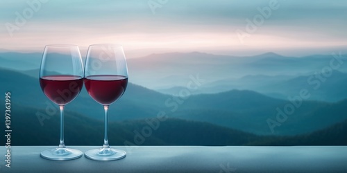Enjoying red wine at sunset with a view of distant mountains and misty valleys