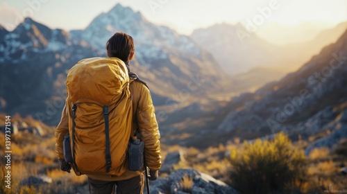 Hiker gazes at mountain vista (9) photo