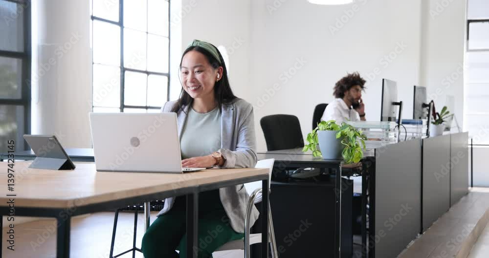 Happy businessman and businesswoman smiling, talking and using smartphone and laptop in office Happy businessman and businesswoman smiling, talking and using smartphone and laptop in office