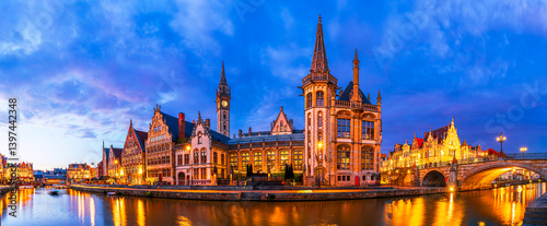 Gent, Belgium: Panoramic view of Graslei old town and embankment Graslei over Leie river at sunset