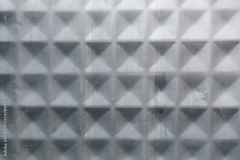 Merforated metal panel close up shot with a perspective